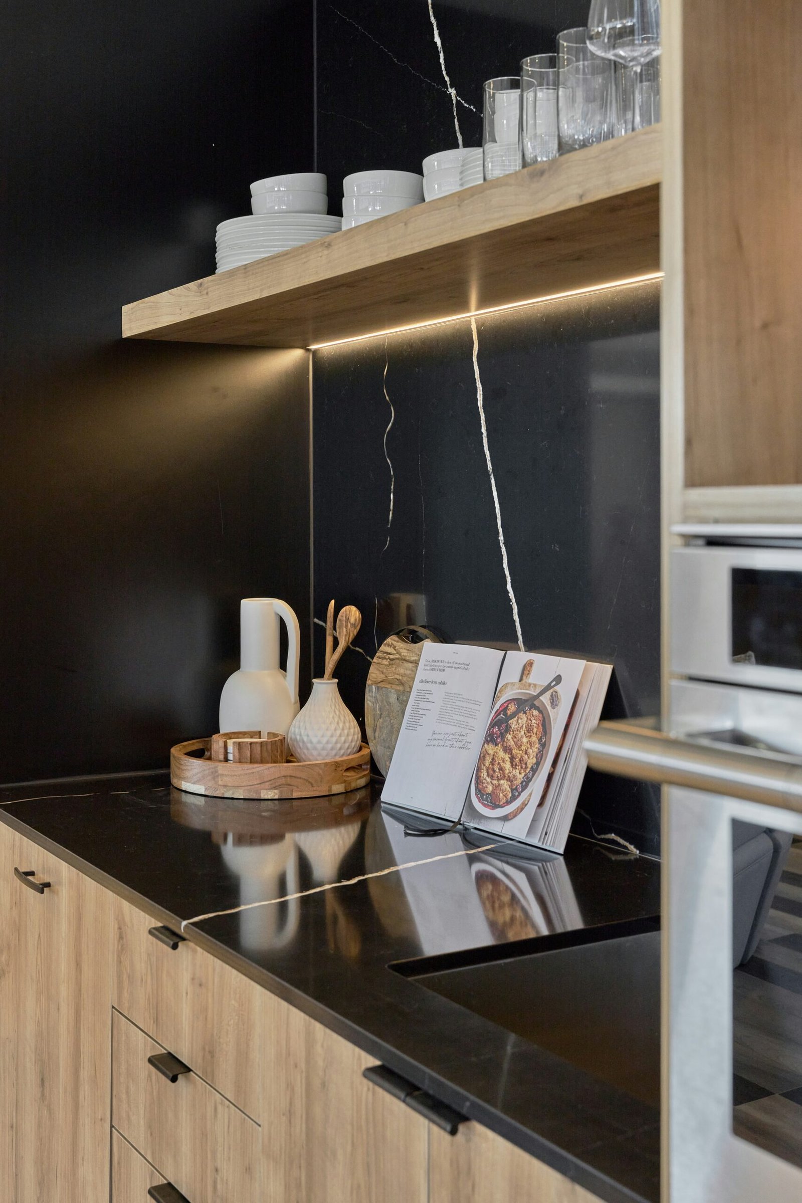 A kitchen with a microwave and a counter top